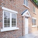 Flush casement windows on a brick house