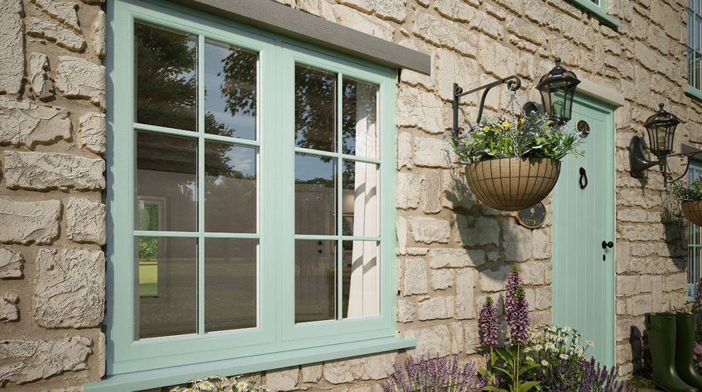 flush sash windows - green with hanging plant on brick house