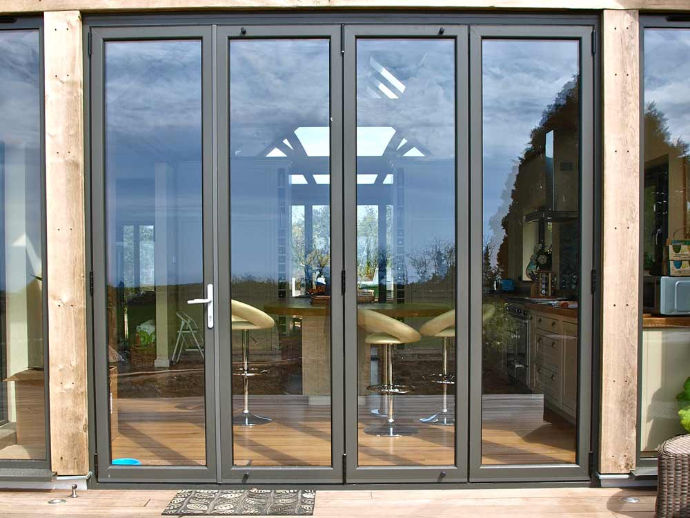 aluminium bi-fold doors Putney - black frame four panel bifold door
