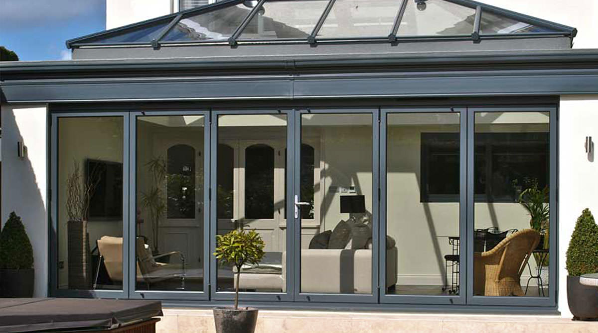 aluminium bi-fold doors Epsom - black farme closed bifold door on rear of property